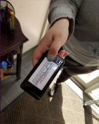 Receptionist holding a pager at Family Dental Care of Milford